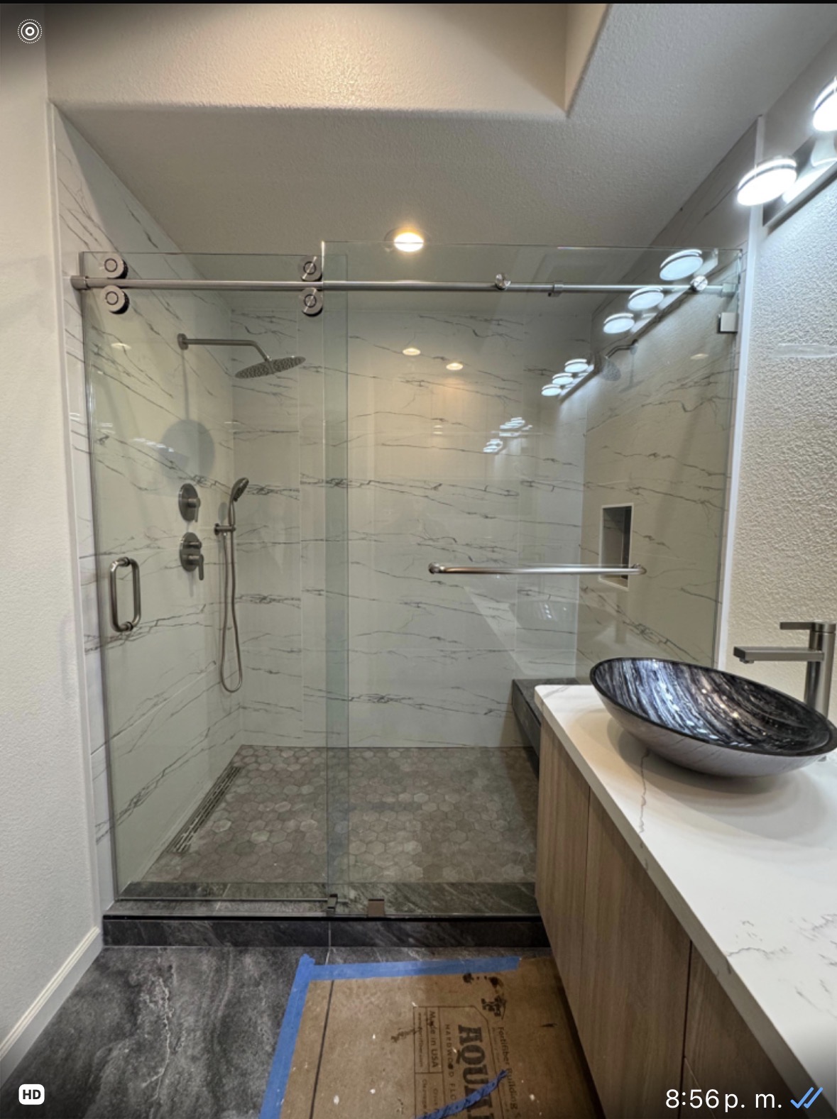 Sliding shower glass installation